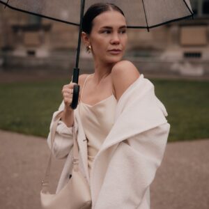 elegant woman with umbrella on a rainy day