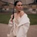 elegant woman with umbrella on a rainy day