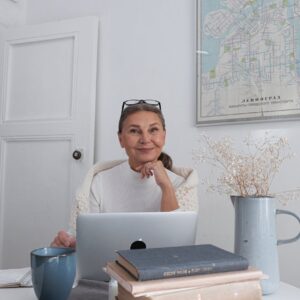 a woman sitting at the table